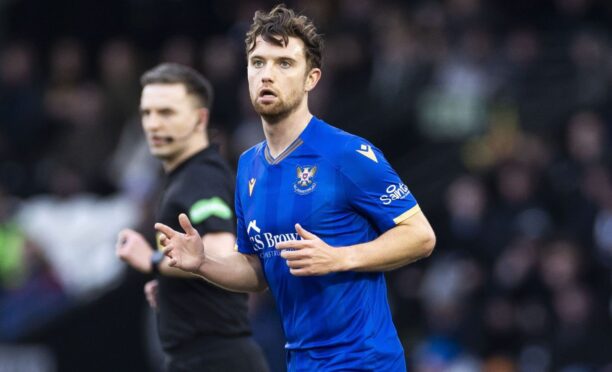 Elliot Watt in action for St Johnstone.