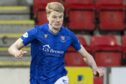 St Johnstone loan defender Zach Mitchell on the ball.