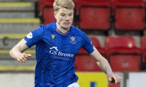 St Johnstone loan defender Zach Mitchell on the ball.