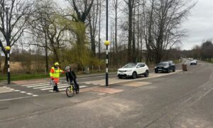 Bridge of Allan locals campaigned to save their primary school lollipop man, Ian Wright. Image: Emma Lockhart