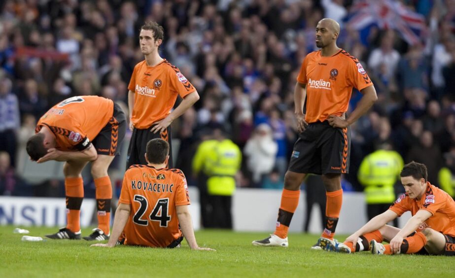 Dejection for Dundee United and Kovacevic, No24, after losing the CIS Insurance Cup final in just his second appearance for the club