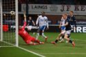 Scott Tiffoney sends a brilliant chance wide against Rangers. Image: David Young/Shutterstock