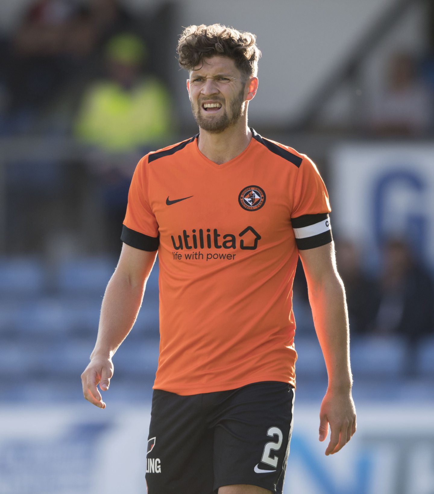 Stewart Murdoch on the pitch for Dundee United while wearing a Utilita kit in July 2018.