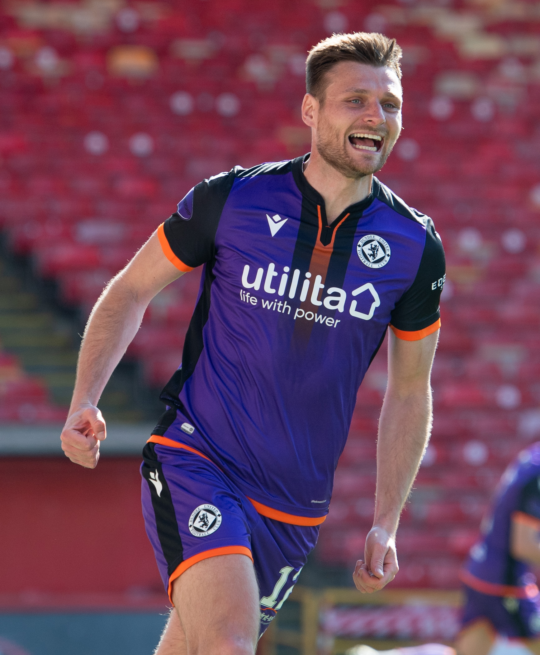 Ryan Edwards in April 2021, wearing the purple third kit