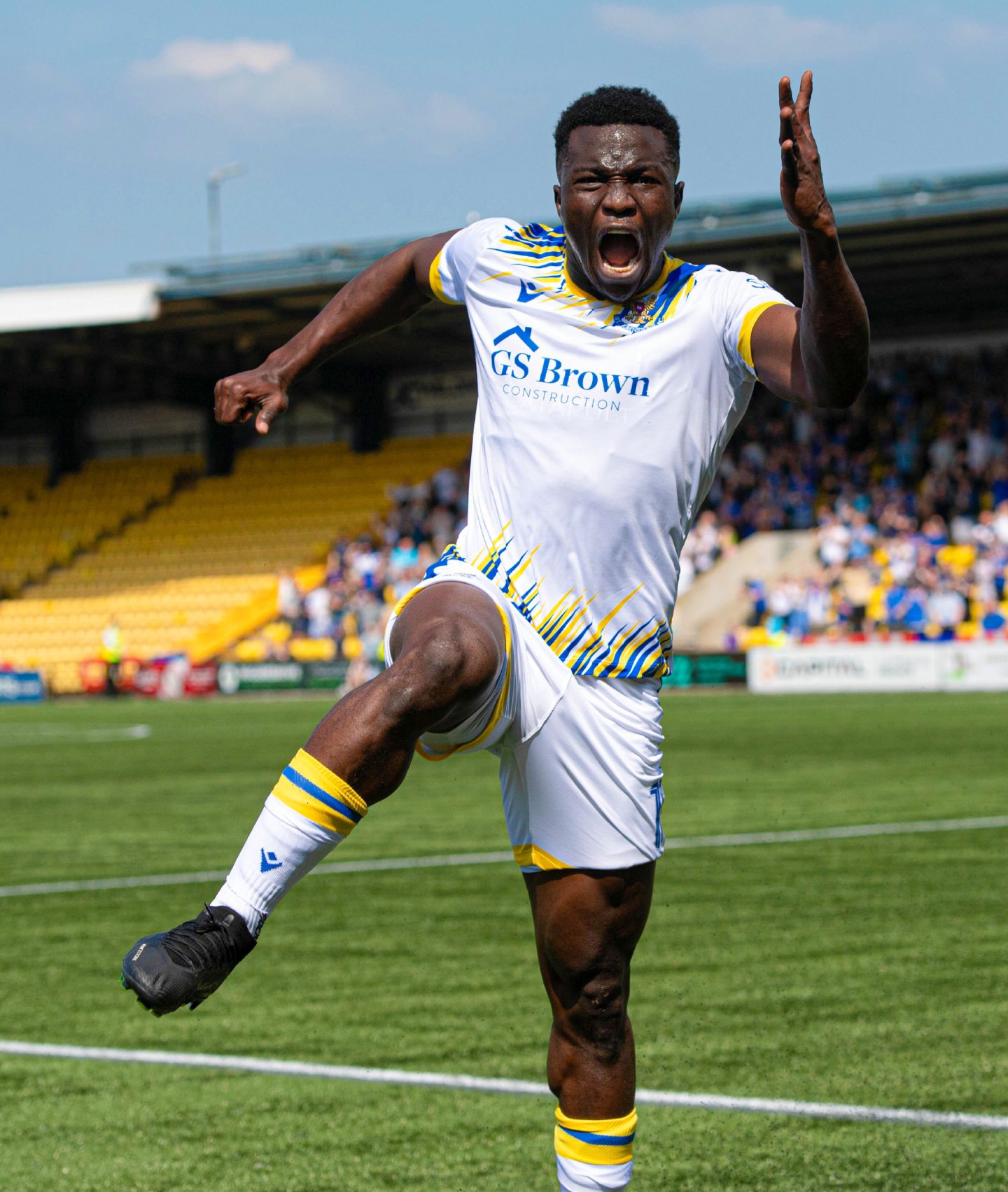 Adama Sidibeh celebrates scoring against Livingston in May 2024.
