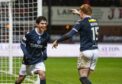 Cesar Garza celebrates after a Dundee derby win