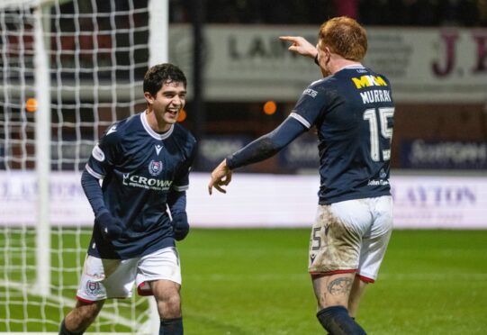 Cesar Garza celebrates after a Dundee derby win