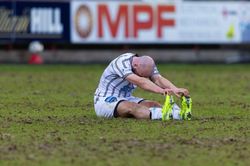 Chris Kane stretches after the full-time whistle following Dunfermline Athletic's win over Morton.