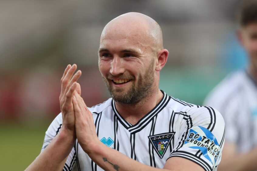 Dunfermline Athletic striker Chris Kane applauds the fans