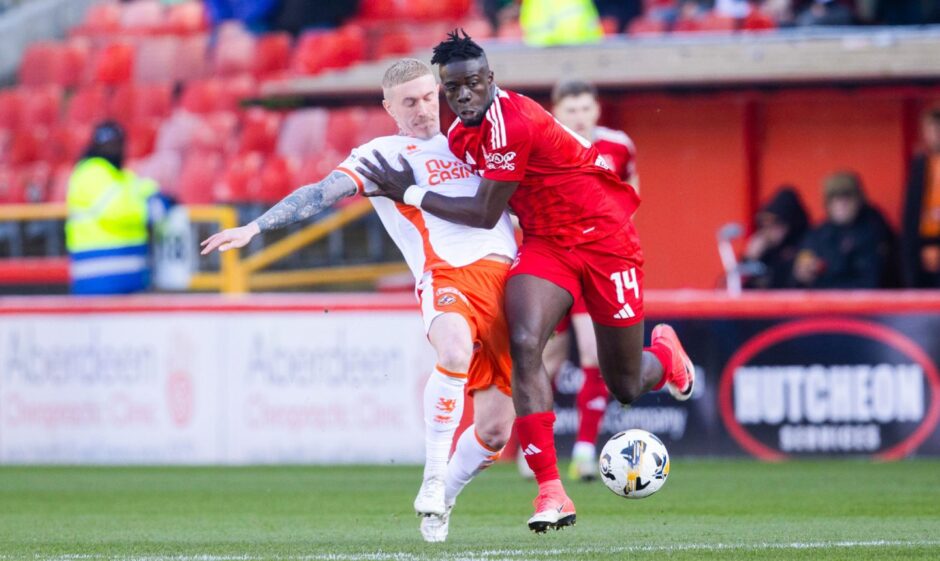 Craig Sibbald gets stuck in during a superb first-half showing