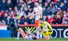 A prone Gallagher on the deck at Pittodrie