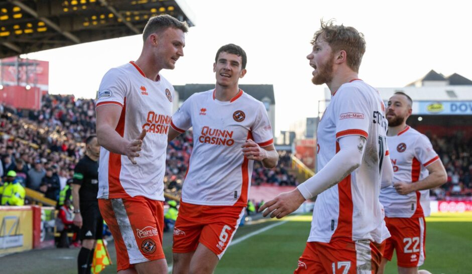 A familiar sight as Sam Dalby is congratulated after scoring