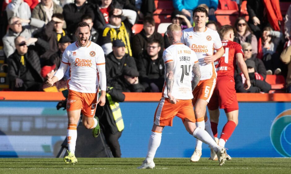 Vicko Sevelj, left, celebrates his opener against Aberdeen