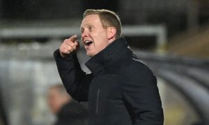 Raith Rovers boss Barry Robson shouts instructions from the sidelines.