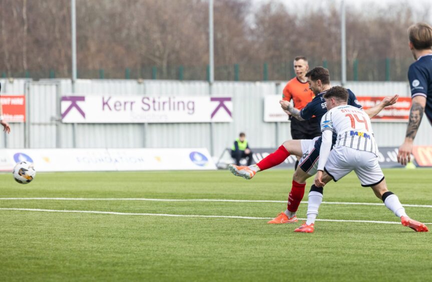 Brad Spencer fires in Falkirk's winning goal.