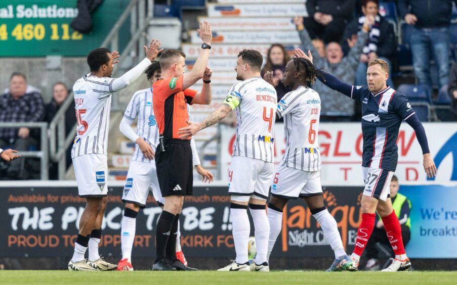 Dunfermline Athletic remonstrate with referee Calum Scott after Chris Kane's goal is ruled out for hand ball.