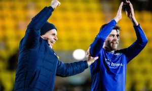 Simo Valakari makes sure Graham Carey takes the acclaim from the St Johnstone fans.