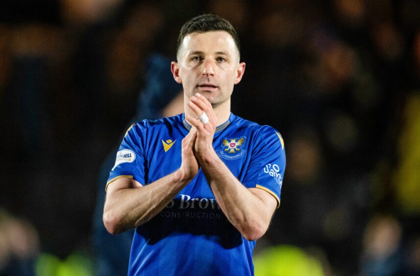 Jason Holt applauds the St Johnstone fans at full-time.