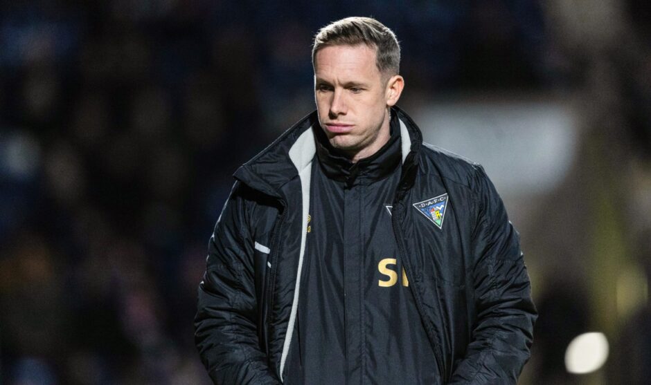 Former Dunfermline Athletic head coach Michael Tidser looks disconsolate after defeat.