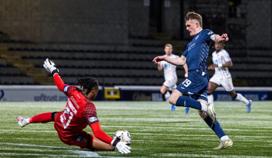 Finlay Pollock rounds Dunfermline goalkeeper Tobi Oluwayemi to net Raith Rovers' Fife derby opener.