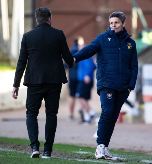 Simo Valakari and Jimmy Thelin shake hands at full-time.