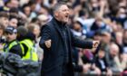 Dundee boss Tony Docherty celebrates a historic derby win. Image: Ross Parker/SNS