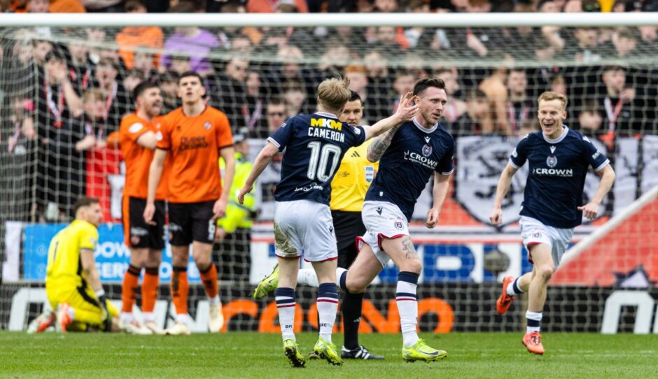 Dundee's Jordan McGHee celebrates his second goal of the game