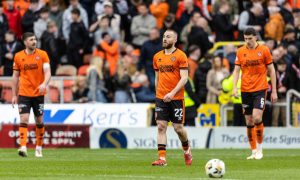 Dundee United players in dejected mood as their afternoon falls apart