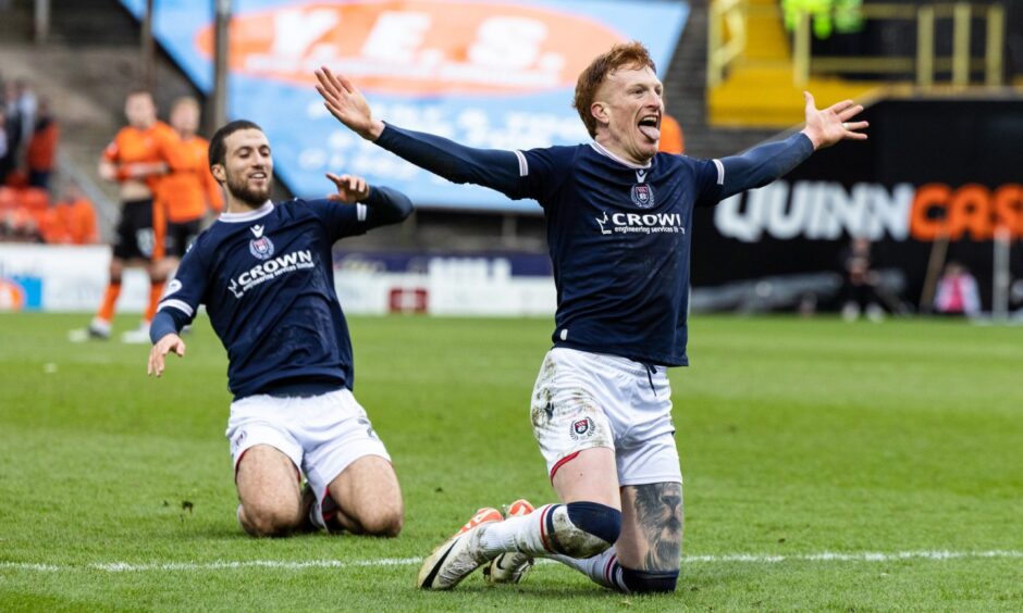 Dundee striker Simon Murray celebrates his goal at Dundee United. Image: Ross Parker/SNS