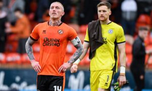 United's Craig Sibbald (L) and Jack Walton look dejected at full-time. Image: Euan Cherry. Image: SNS