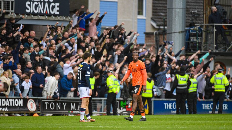 Emmanuel Adegboyega makes the long walk after being given his marching orders