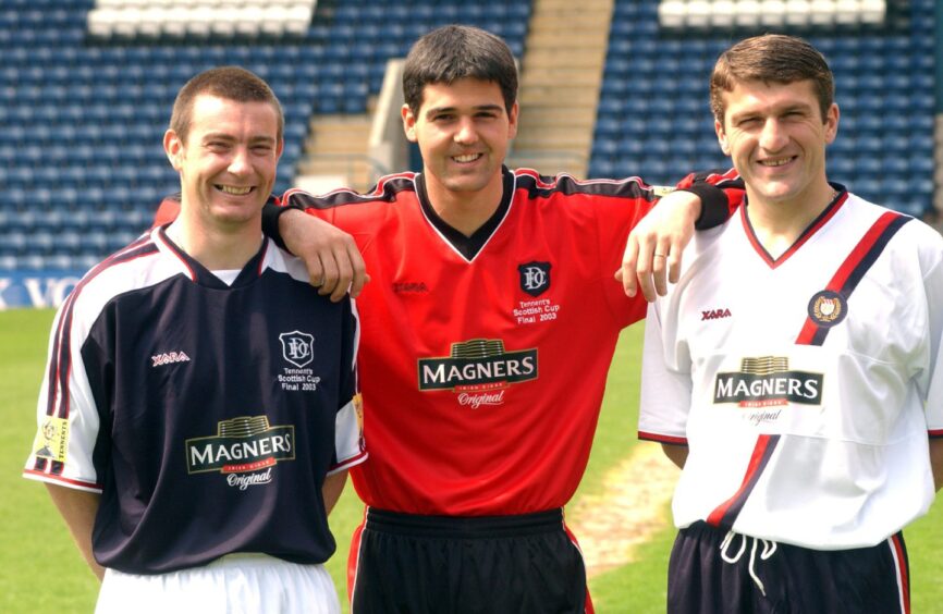 Dundee FC players Barry Smith, Julian Speroni and Georgi Nemsadze in the Magners kit