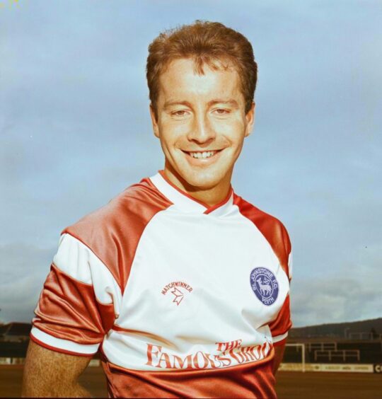 Danny Powell in 1987, wearing the Matchwinner kit with the Famous grouse sponsor