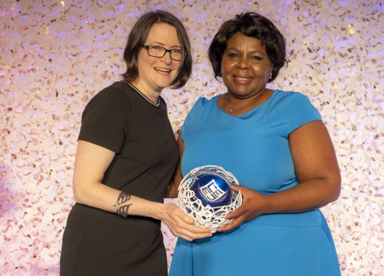 Joyce Onuonga, owner of John White & Son (right) holding her CeeD award with sponsor Geraldine Boylan, director of Arthian. Image: CeeD