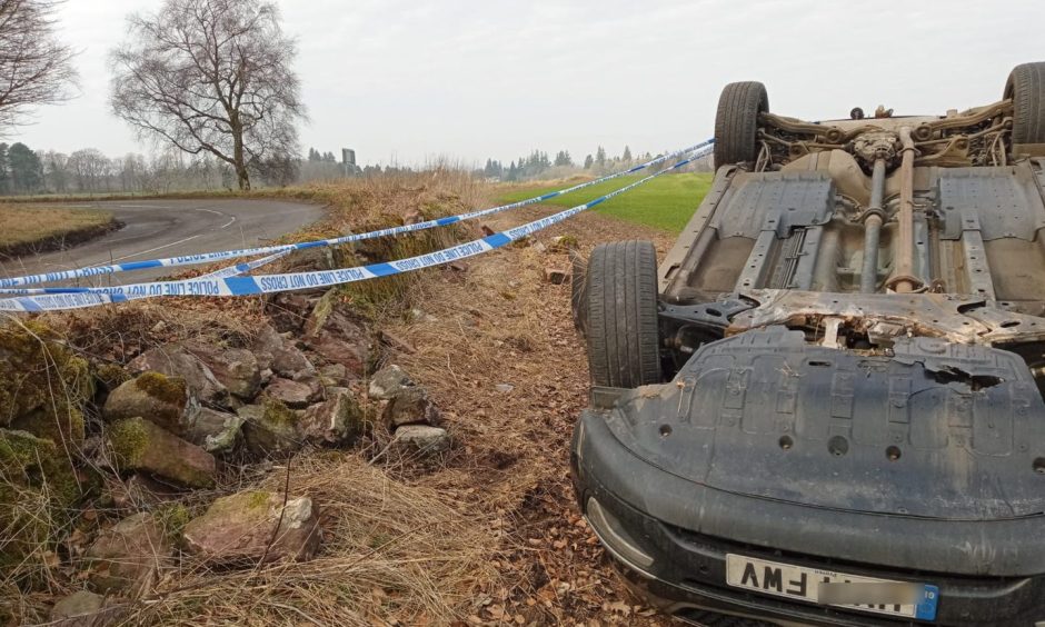 Scott's car flipped following the crash near Kirriemuir.