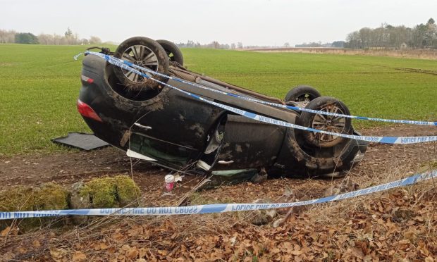 Scott's car was badly damaged in the crash.