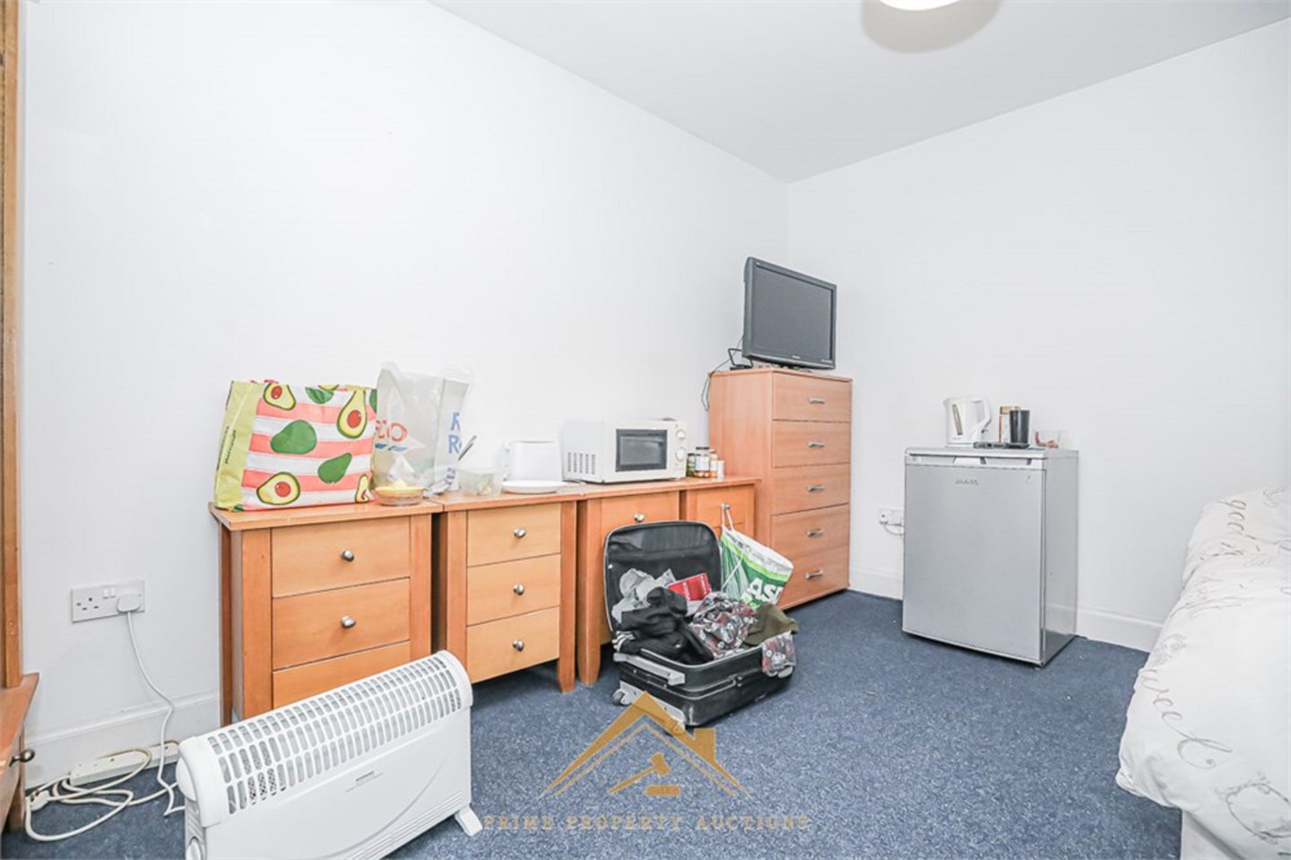 Another view of one of the bedrooms in the upstairs flats.