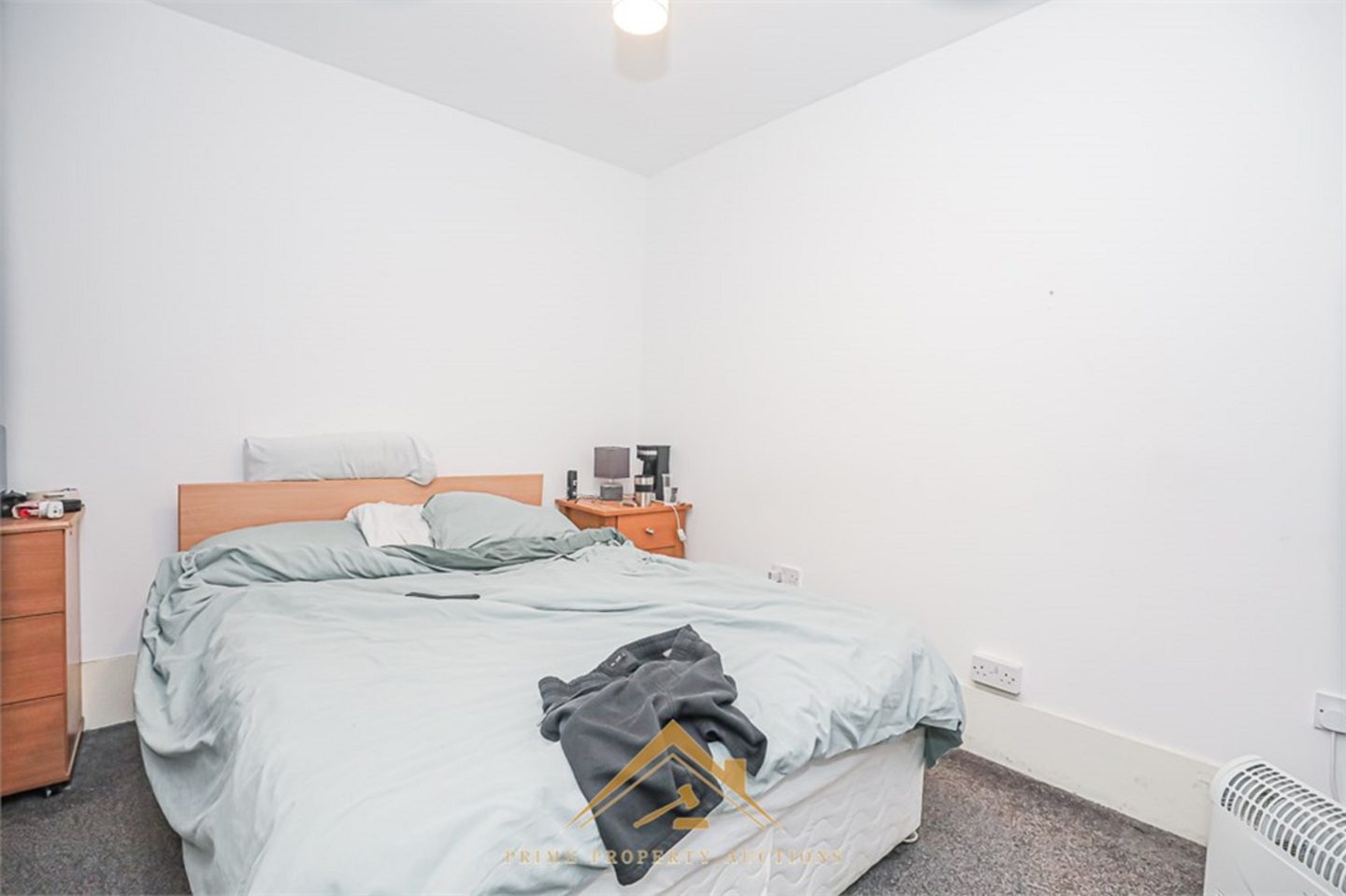 A bedroom in one of the upstairs flats.