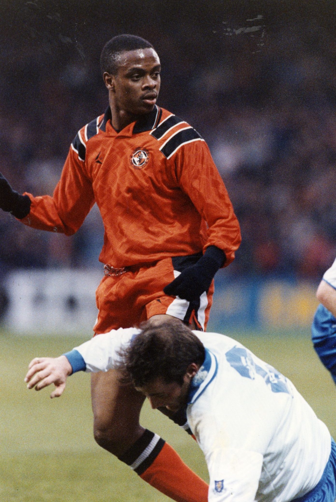 Jerren Nixon playing for the Tangerines in the kit that had no sponsor in April 1994