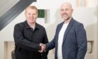 Neil Lennon shakes hands with Dunfermline chairman and CEO David Cook.