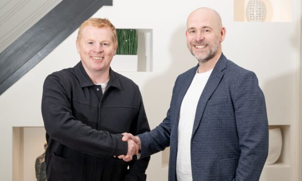 Neil Lennon shakes hands with Dunfermline chairman and CEO David Cook.
