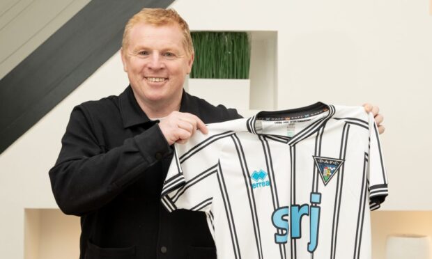 New Dunfermline Athletic manager Neil Lennon holds up a Pars strip.