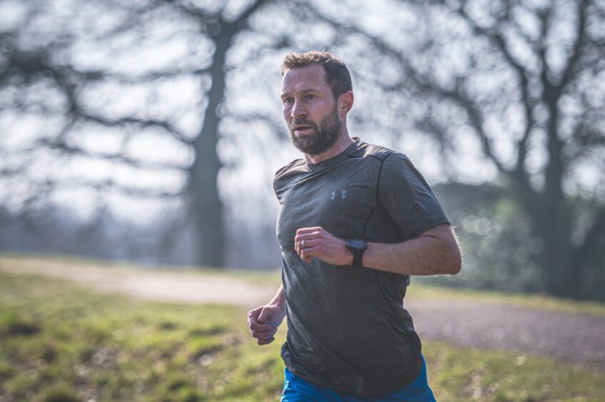 A man runs during the duathlon.