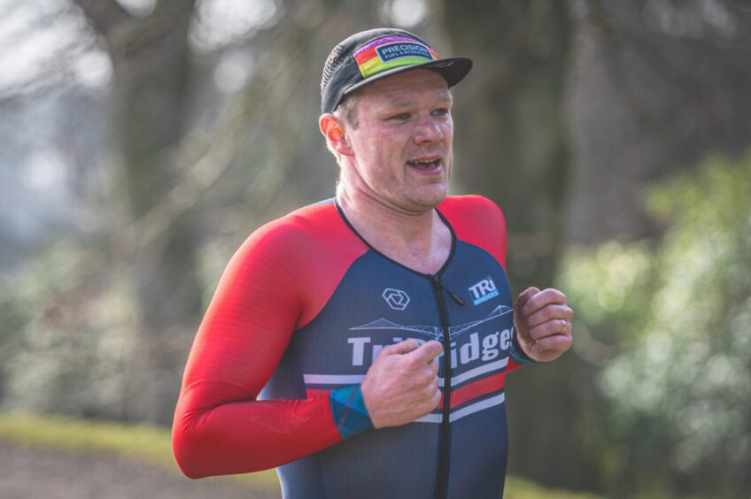 A man smiles during the race.