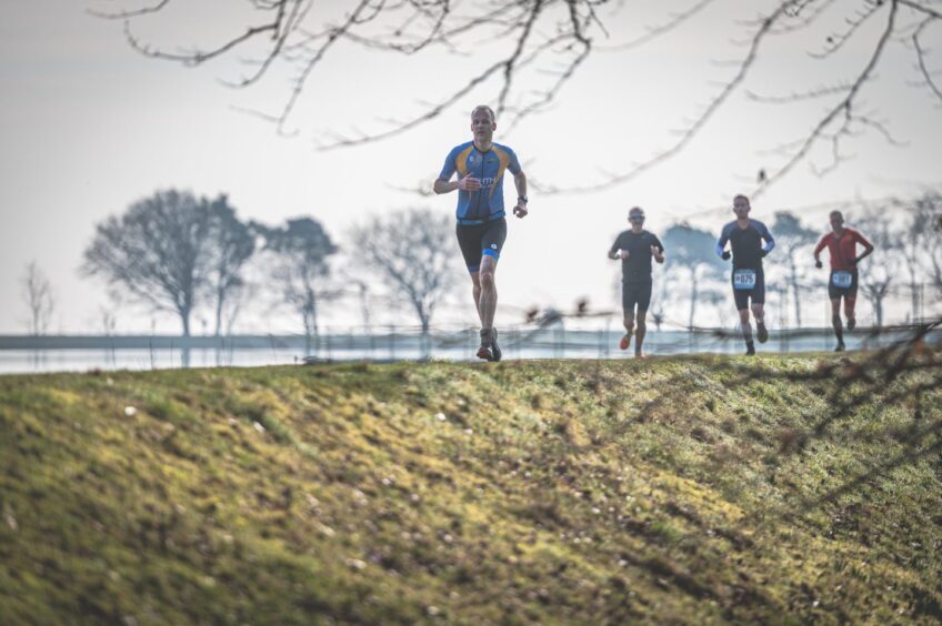 Competitors run through the lovely scenery during the Winter Duathlon at Monikie Country Park