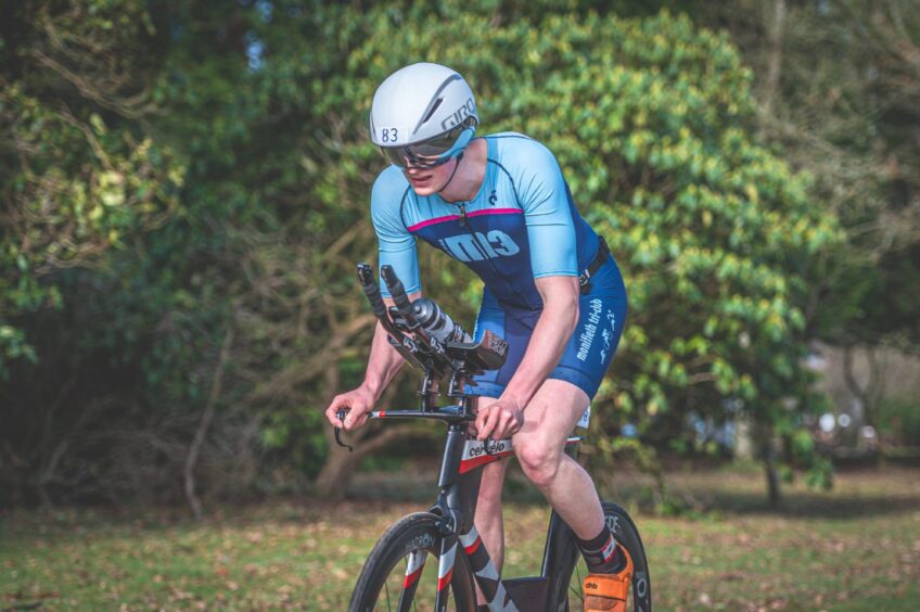 A cyclist powers through the course at Monikie Country Park. 