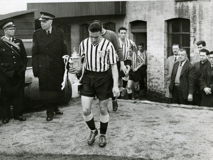 Captain Ron Mailer with the Scottish Cup in 1961, his Dunfermline Athletic team-mates behind him