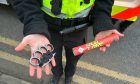 Youth found to be carrying a knuckleduster and pyrotechnic flare.