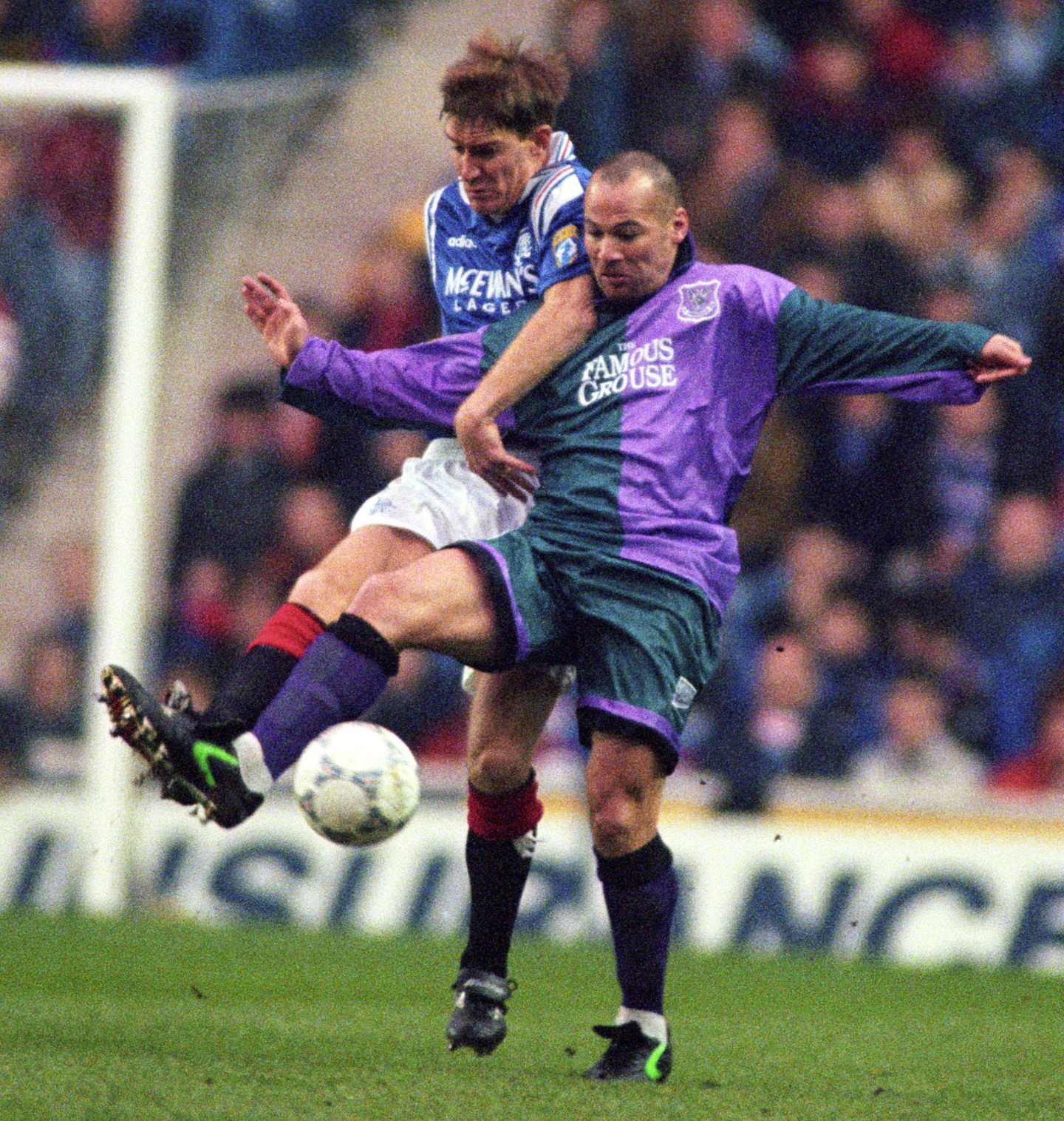 George O'Boyle challenges Rangers defender Richard Gough for the ball in January 1997