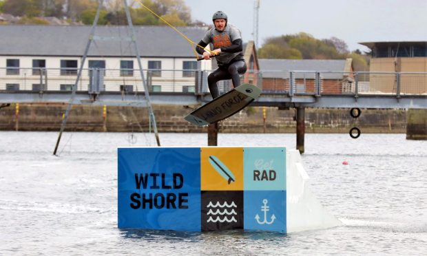 Evening telegraph/ Courier news CR0028006   G Jennings pics , Foxlake Aquapark at Victoria dock  Dundee have  rebranded themselves and are now known as " Wild Shore" aquapark , water boarder Fraser Cameron was there to promote the new brand , thursday 6th May.